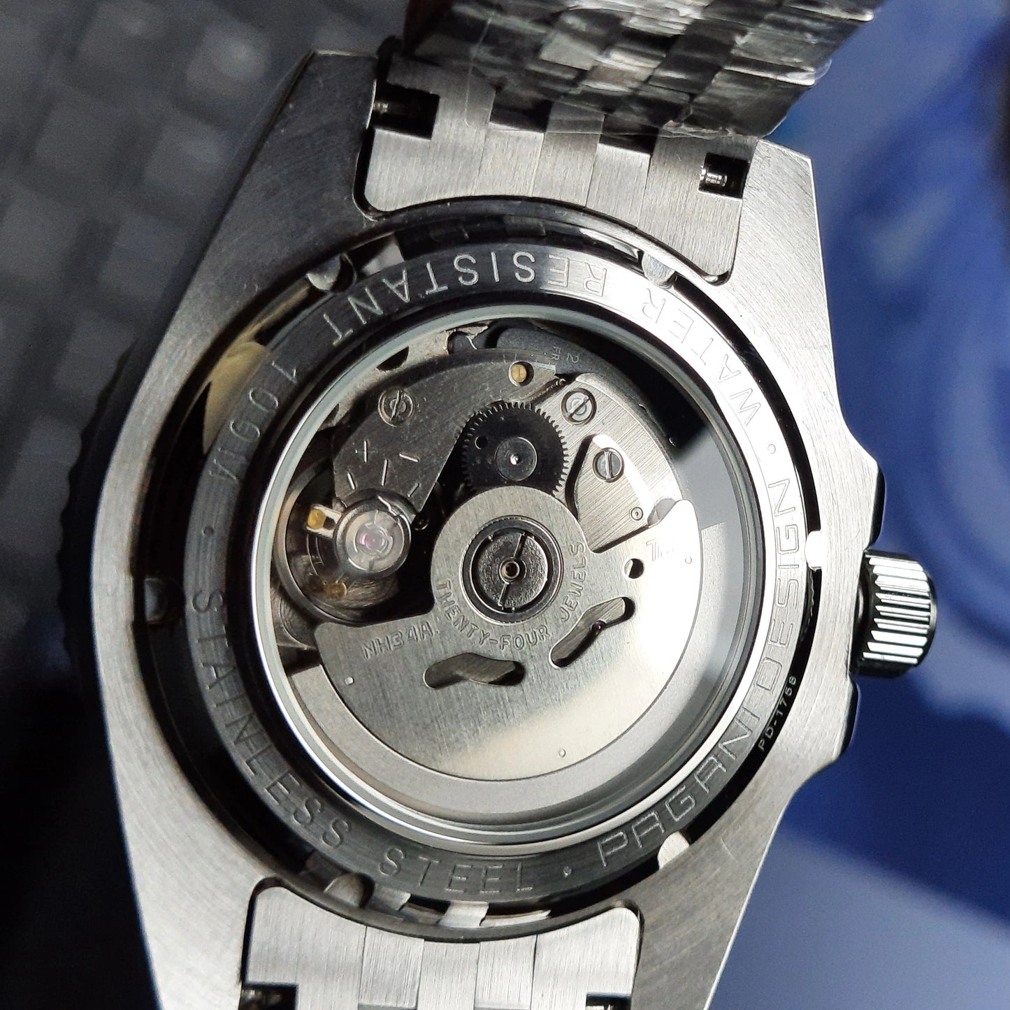 Display case back showing NH34 automatic movement – PAGANI DESIGN PD-1662 GMT Batman
