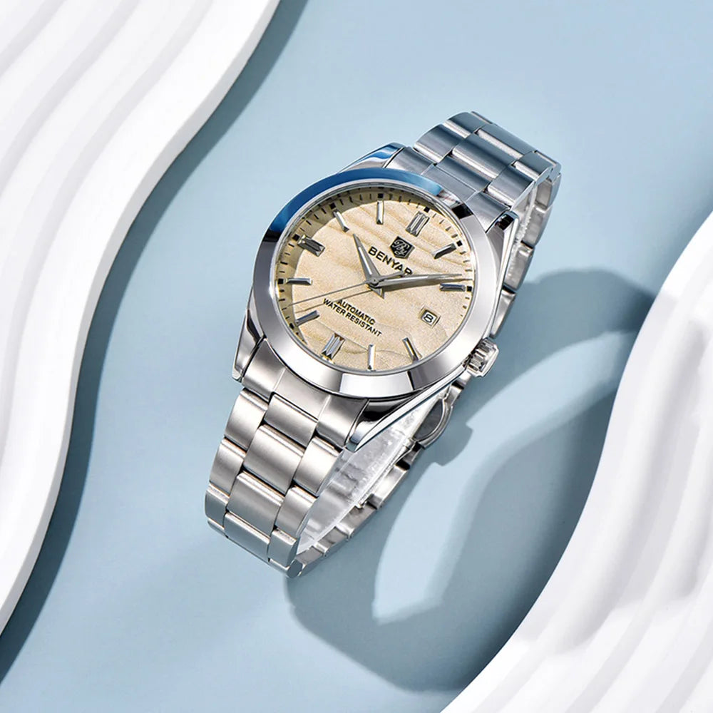 Close-up of beige sand pattern dial with golden texture