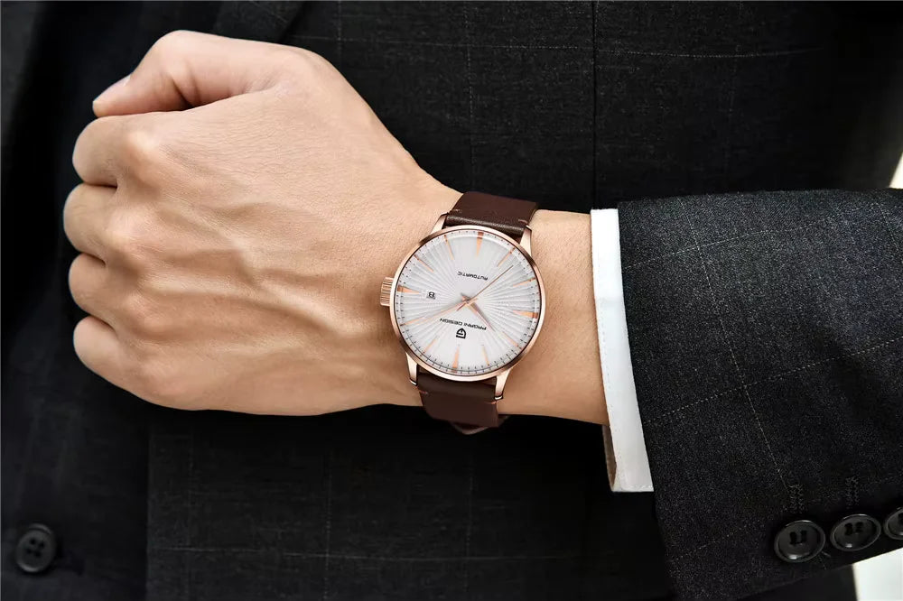 Pagani design PD 2770 Hand wearing a watch with a brown leather strap 