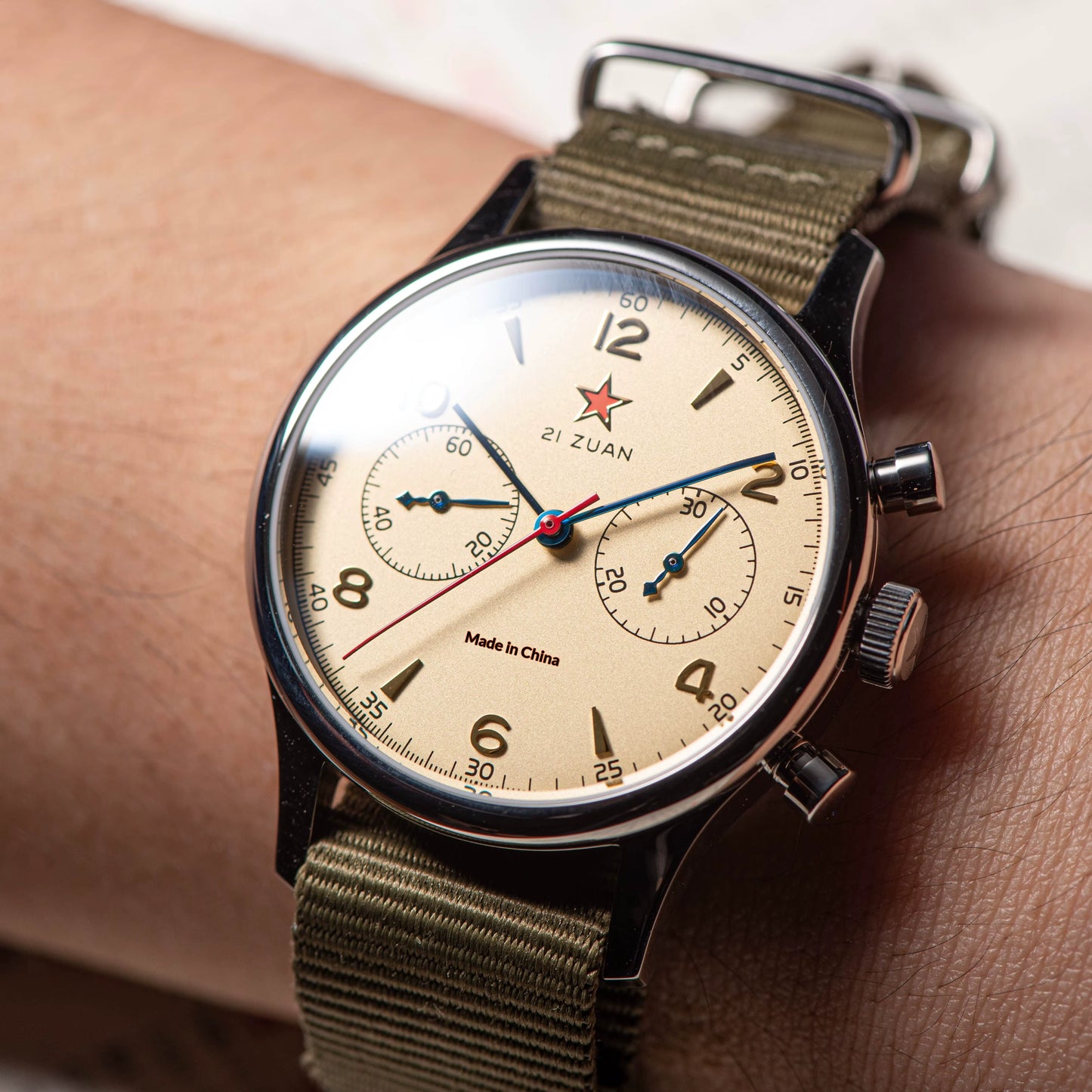 Seagull 1963 vintage chronograph watch on wrist outdoors
Image Name: seagull-1963-lume-shot